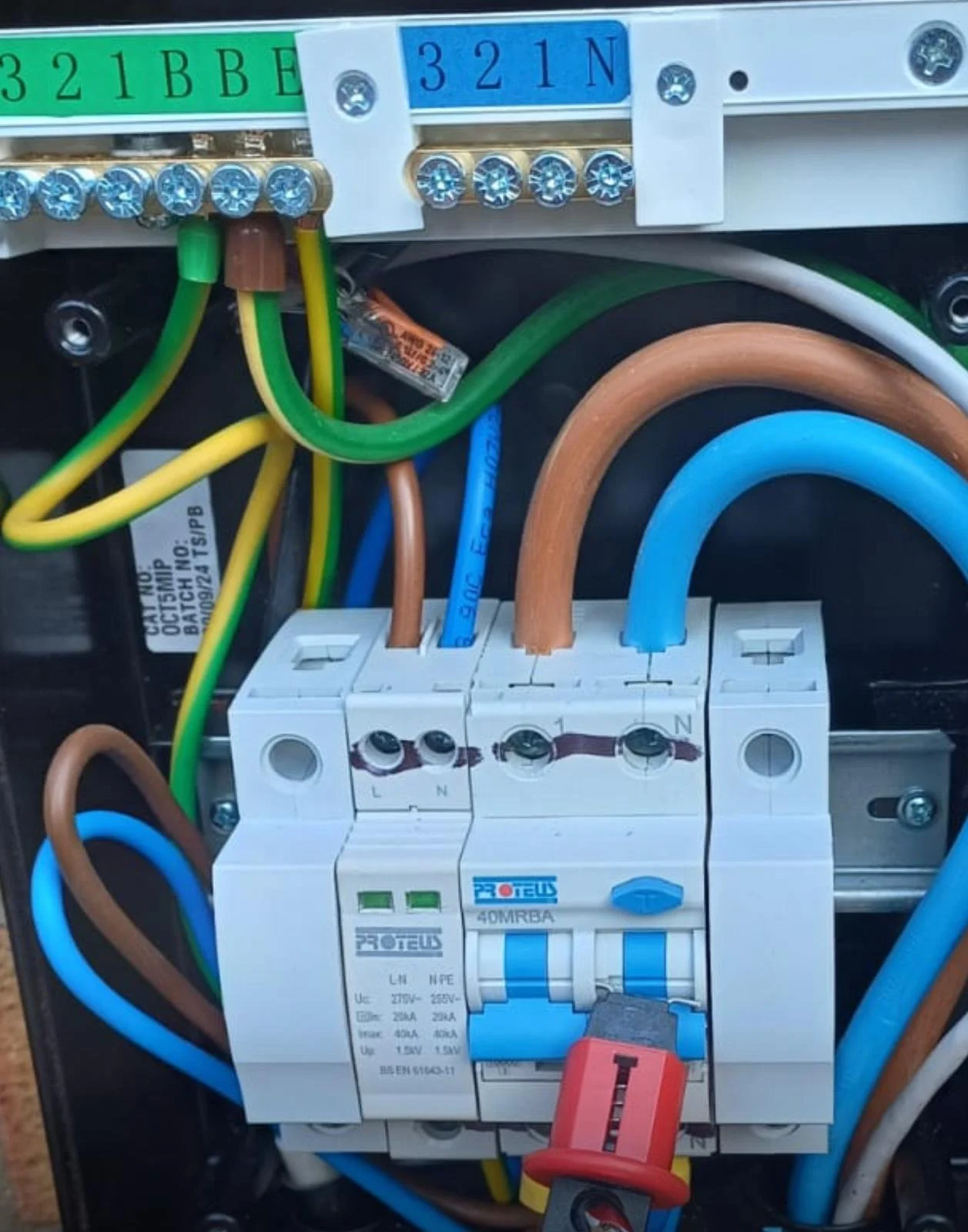 Precision internal wiring structure of a newly fitted distribution board.